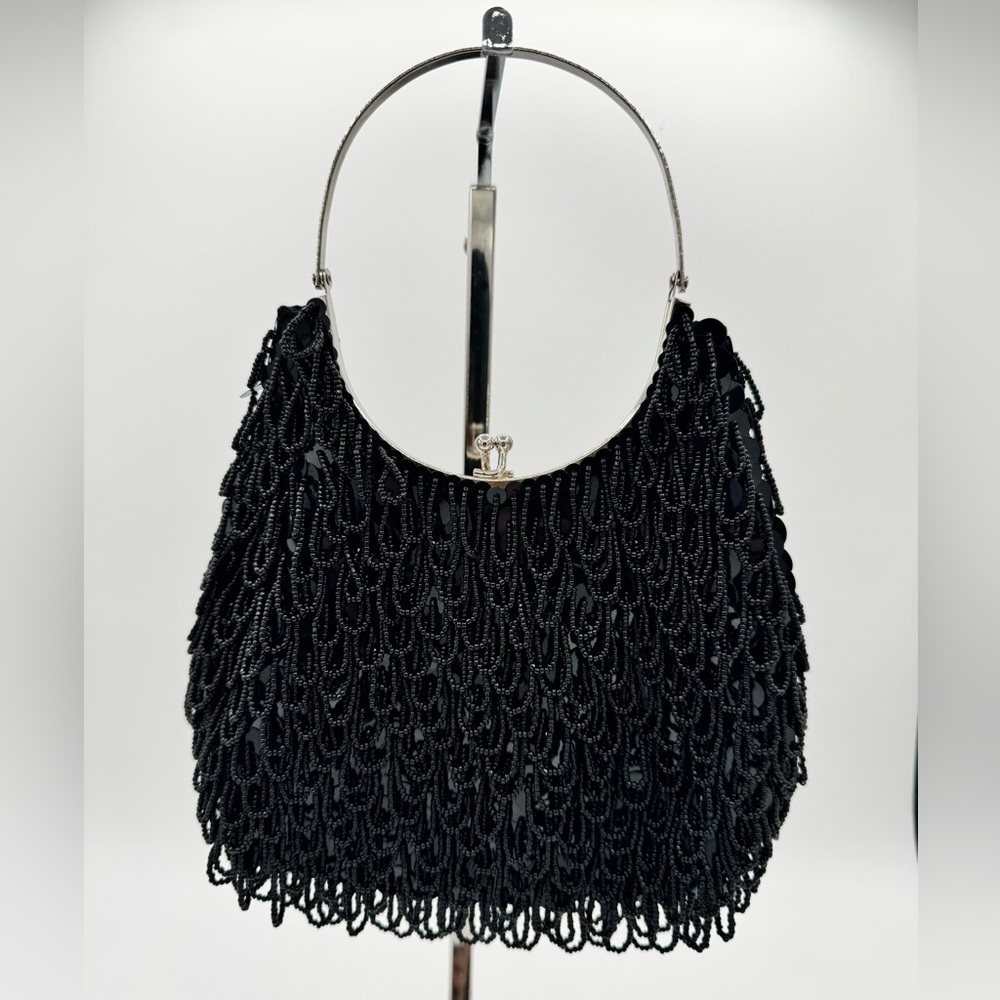Lily Scott handbag , black beads and sequins. Silver handle.Satin interior